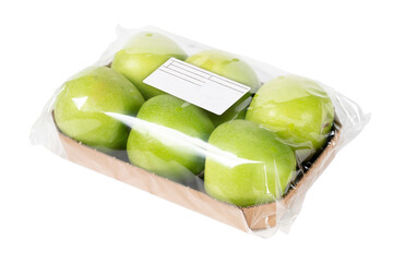Packed and labeled green apple on isolated white background