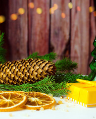 Festive wooden background with glittering bokeh lights, illuminated by a spotlight, ideal for Christmas or other occasions