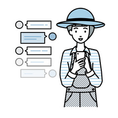 立ってスマートフォンで楽しくチャットで会話する農家の女性