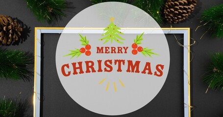Composition of merry christmas text over frame and pine cones