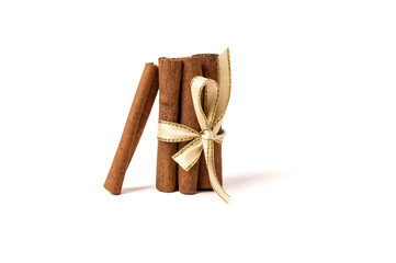 Brown cinnamon sticks on a white background. Seasoning in cooking.