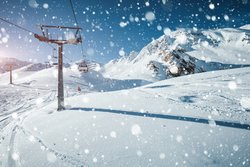 Fototapeta na wymiar Sunny winter day in skiing area. Location place famous ski resort Ischgl/Samnaun.