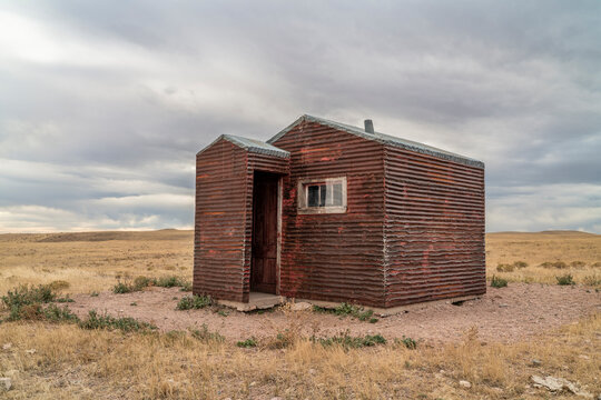 old, metal, rusty shack on a prairie - Soapstone Prairie Natural Area in northern Colorado