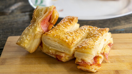 Homemade puff pastry pizza with bacon