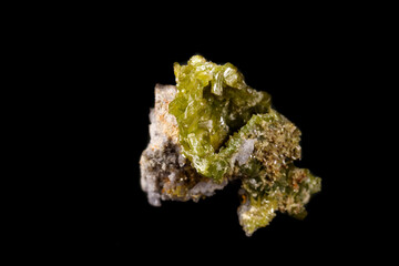 Macro Pyromorphite mineral stone on a black background