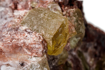 Macro mineral stone.Golden Apatite on a white background