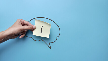 The silhouette of the brain and the icon of information in it. A symbol for obtaining the necessary...