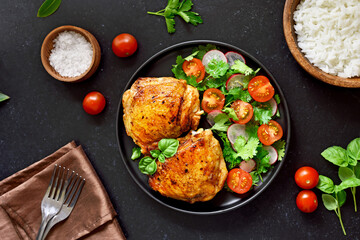 Fried chicken thighs with vegetables