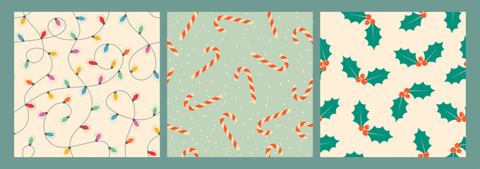 Vector set Christmas seamless patterns. Candy canes, holly berries and colored festive garlands. Design for gift wrapping paper, fabric, clothes, textile, wallpaper.