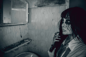 Portrait of asian woman make up ghost,Scary horror scene for background,Halloween festival...