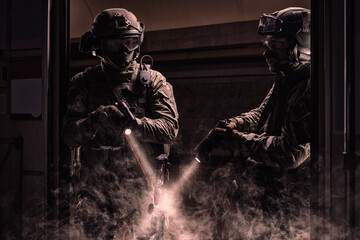 Soldiers of a special anti-terrorist unit storm a railway carriage in the subway. Special operation...