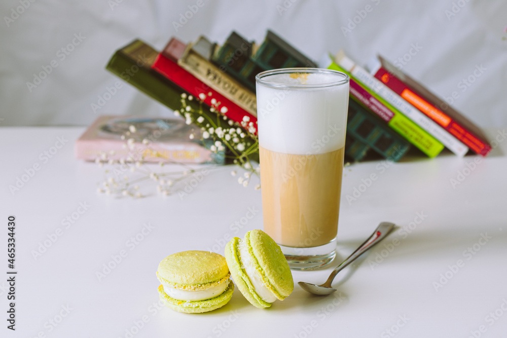 Wall mural set of macaroons with flowers and coffee cup in cafe