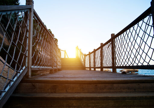 A wooden walkway on seaside.