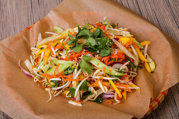Asian salad with mango and cabbage