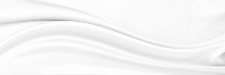 White gray satin texture that is white silver fabric silk panorama background with beautiful soft blur pattern natural.