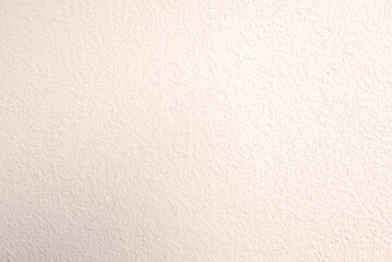 Seamless texture of white cement wall a rough surface warming filter, with space for text, for a background..