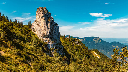 Beautiful alpine summer view with a huge rock at the famous Kampenwand, Aschau, Chiemgau, Bavaria, Germany