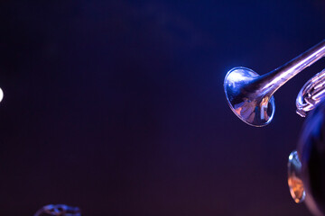 Trumpet bells on a dark background