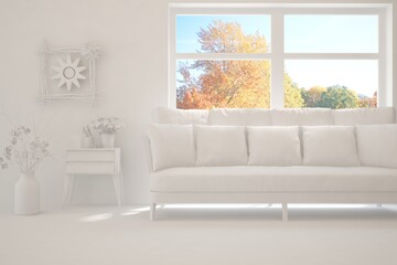 Stylish room in white color with sofa and autumn landscape in window. Scandinavian interior design. 3D illustration