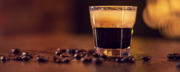 coffee shot on wooden bat table close up panorama