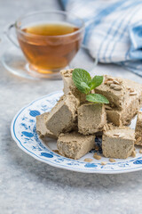 Sunflower halva close-up.  Sweet oriental dessert halva. Sweets for tea.