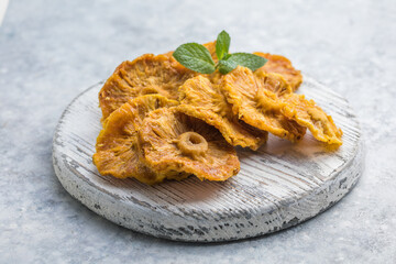 Dried pineapple candy rings, close-up.