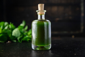 green oil parsley or basil fresh mint ready to eat meal snack copy space food background rustic 
