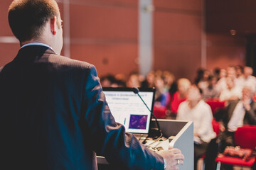 Speaker at Business Conference and Presentation.