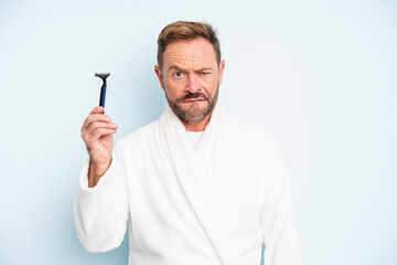 middle age man looking puzzled and confused. shave concept
