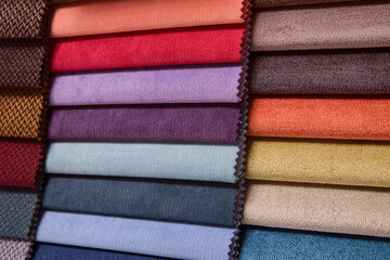 Catalog of colored fabrics of different colors and textures for the selection of fabrics for the production of upholstered furniture