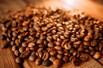 roasted coffee beans with beautiful backlight. use as background. fragrant and useful background. macro photo of coffee beans