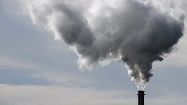 Air pollution with smoking chimney
