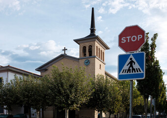 Traffic signals and church in Pamplona, Spain.