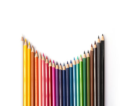 Colorful multicolored pencils on white background. Education, Business and finance concept with copy space. Art