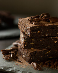 Chocolate Brownie with banana and almond on slate