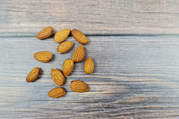 The Natural almond nut close-up. Peeled almonds and nuts.