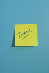 Today! - inscription on a yellow sticker on a blue background