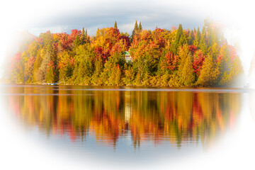 Lac Creuxl in Autumn showing fall colors in cottage country, Quebec Canada.