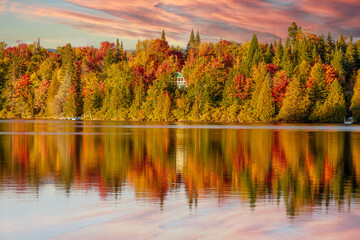 Lac Creuxl in Autumn showing fall colors in cottage country, Quebec Canada. - 465380496