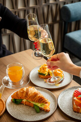 woman drinking champagne in the restaurant