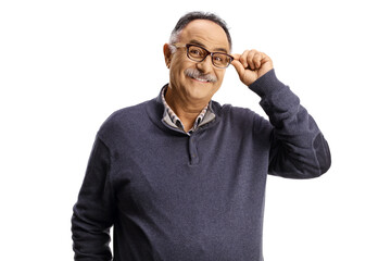 Mature casual male smiling and holding his glasses