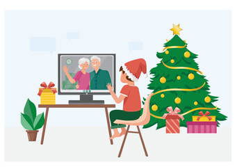 The boy communicates via video link with his grandparents and wishes them a Happy New Year. Family video chat. Decorated Christmas tree with gifts nearby.