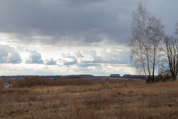 early springtime landscape with a gloomy sky
