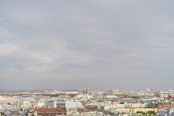 Panorama of St. Petersburg from the background height. View of the rooftops of St. Petersburg in autumn. Points of interest and city center