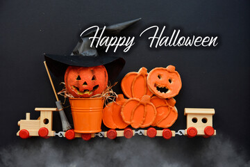 Halloween kids train Trick or Treat with pumpkin, ghost, skeleton cookies and sweets. Happy...