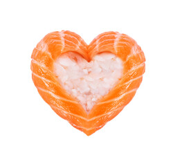 Sushi roll with salmon in the shape of a heart close-up