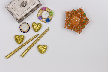 Handcrafted Eco Friendly Clay Diya Deep Dia and golden candle heart shaped with gift box and copy space