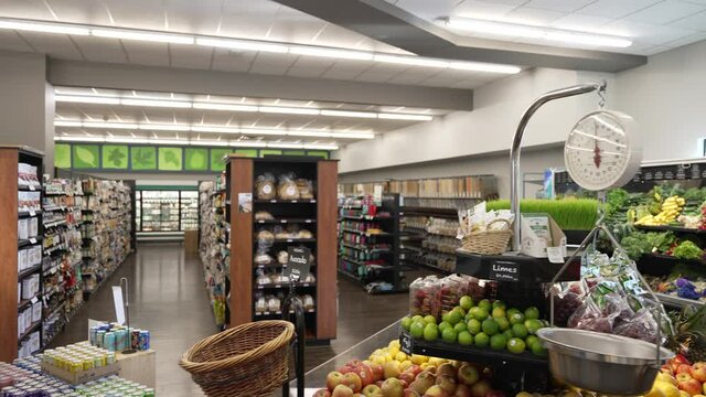 Natural organic healthy grocery store interior with produce section and aisles