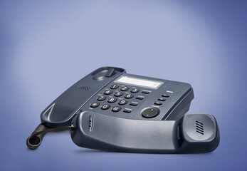 vintage dial-up digital desk phone on the office table