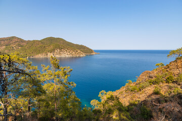 Beautiful nature landscape of Turkey coastline. View from Lycian way to small bay of Mediterrain sea. This is ancient trekking path famous among hikers.